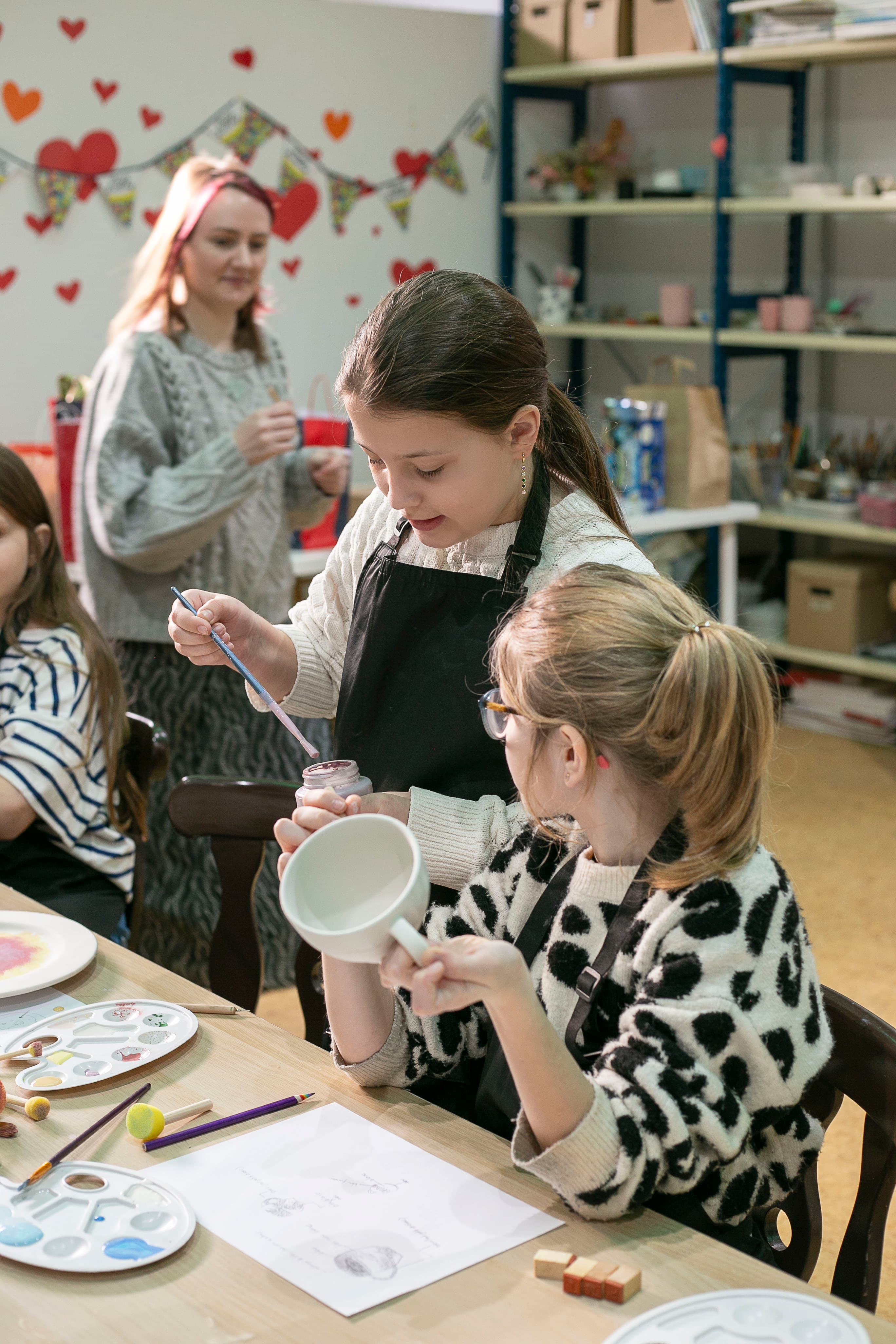Kids working together on ceramics